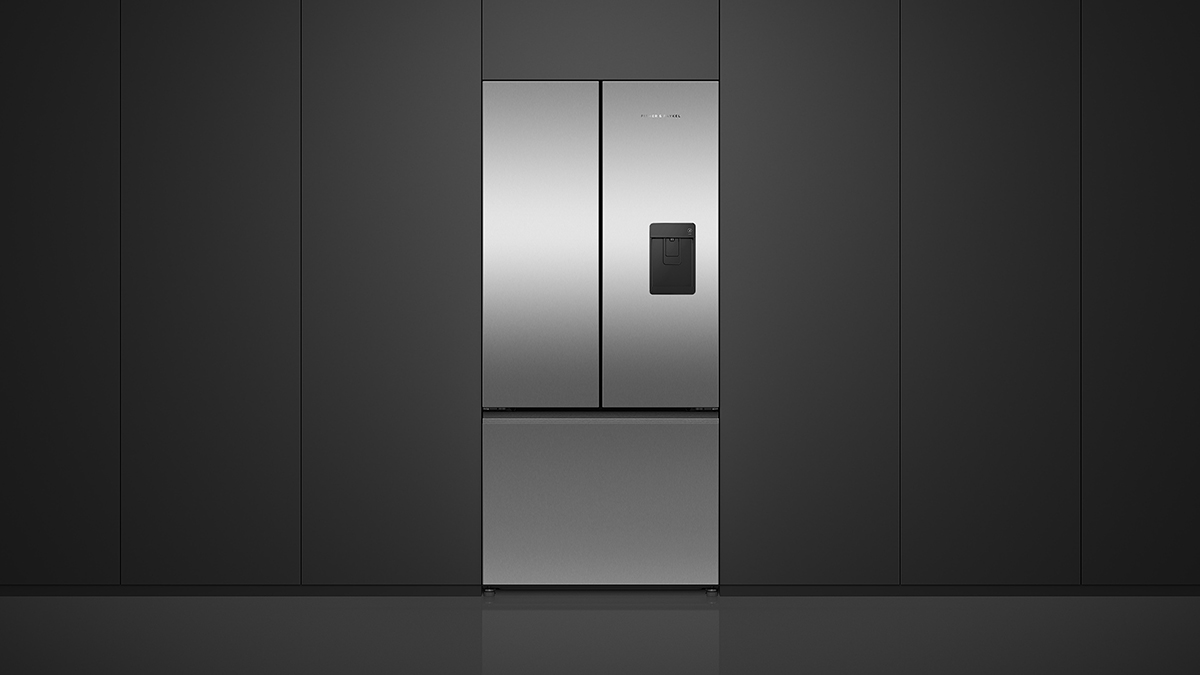 Silver Freestanding Refrigeration Set into Black Cabinetry.