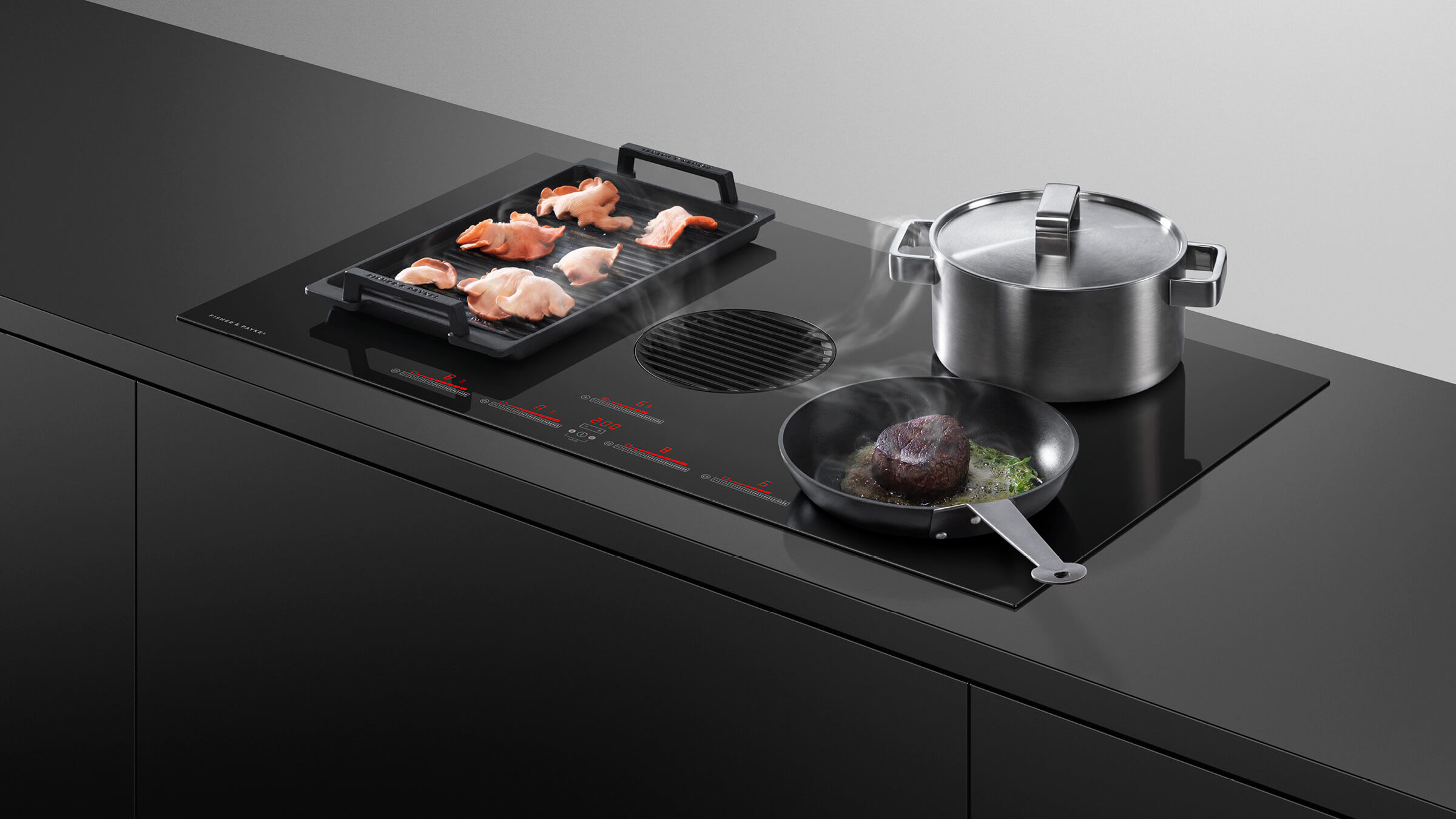 cooktop with integrated ventilation system